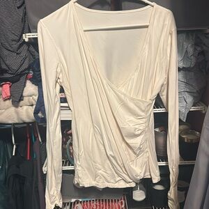 Lulu size 12 long sleeve shirt. Wrapped synch style very flattering.